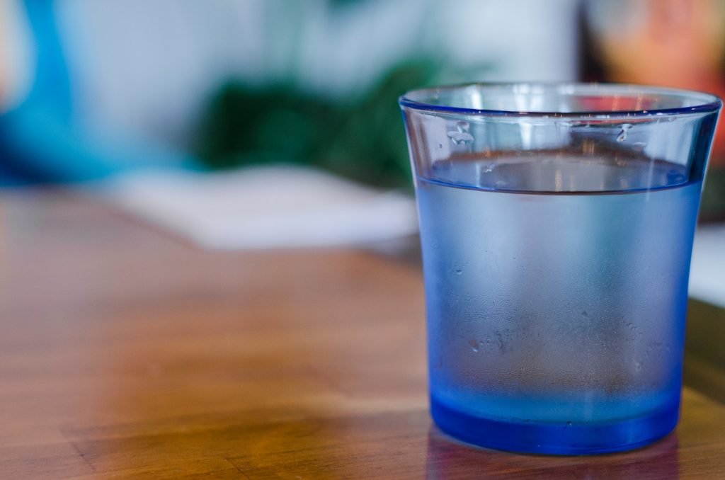 Blue glass of water.